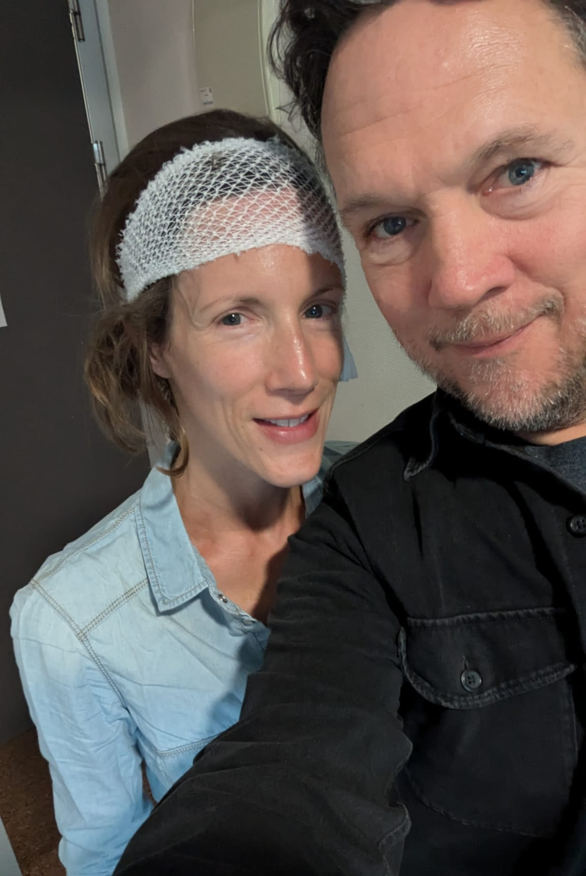 Photo of carly with a net headband and her partner - ready to go home!